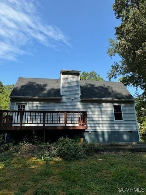 rear view of house with a deck