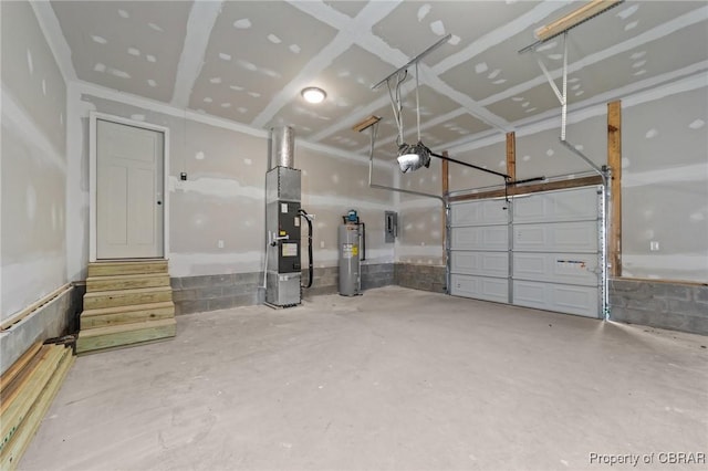 garage with electric panel, heating unit, a garage door opener, and water heater