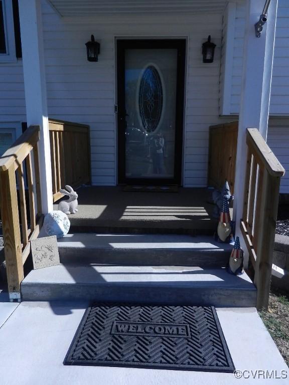 entrance to property with covered porch