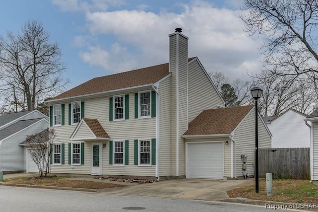 colonial home featuring a garage