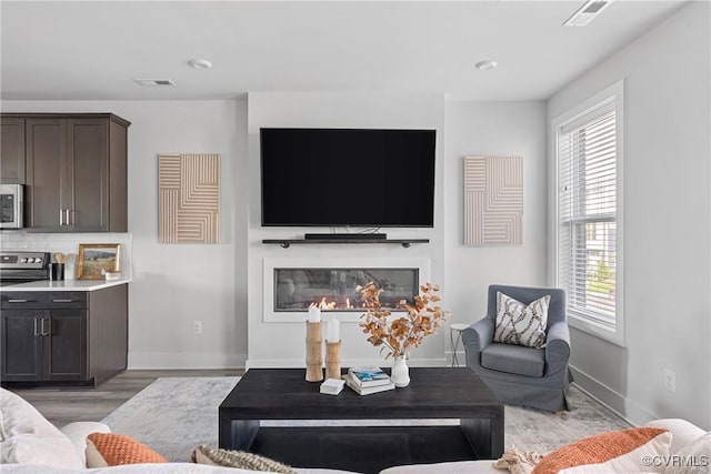 living room with light wood-type flooring