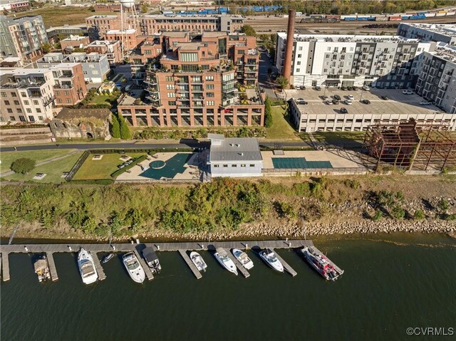 drone / aerial view with a water view