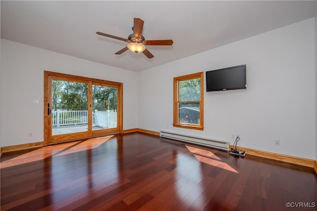 unfurnished room with wood-type flooring, baseboard heating, and ceiling fan