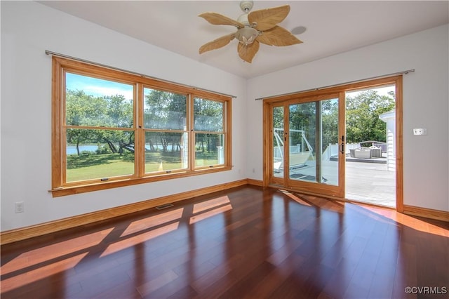 interior space featuring hardwood / wood-style floors and ceiling fan