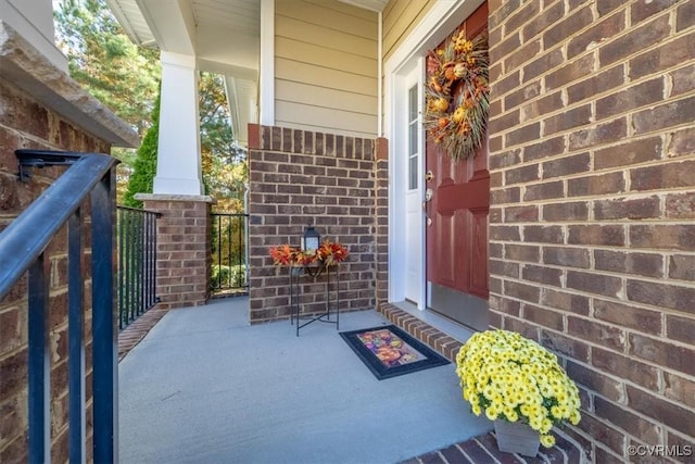 entrance to property with covered porch