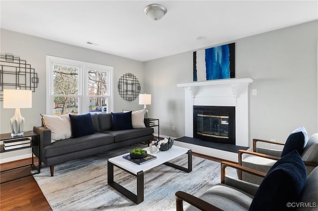 living room with light hardwood / wood-style flooring