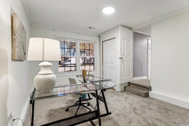 home office featuring carpet floors and ornamental molding