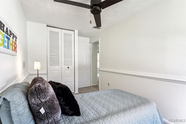 bedroom with a closet and ceiling fan