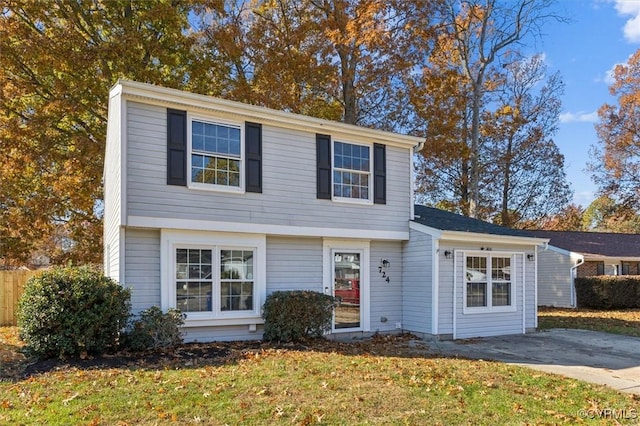 view of front of house with a front lawn