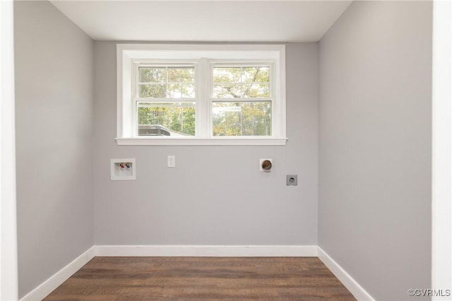 laundry area with hookup for an electric dryer, hookup for a washing machine, and dark hardwood / wood-style floors