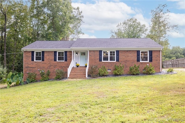 ranch-style house with a front lawn