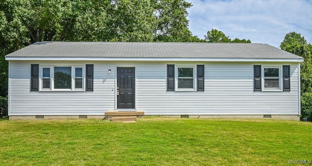 manufactured / mobile home with a front lawn