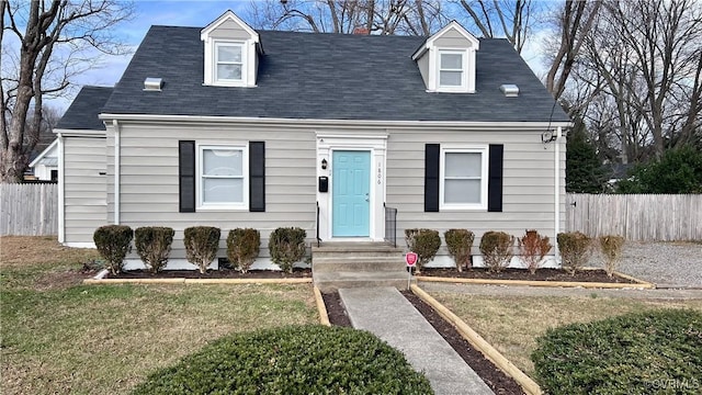 new england style home with a front yard