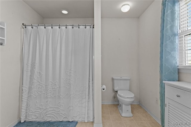 bathroom featuring toilet