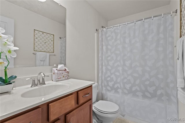 full bathroom featuring vanity, shower / bath combination with curtain, and toilet