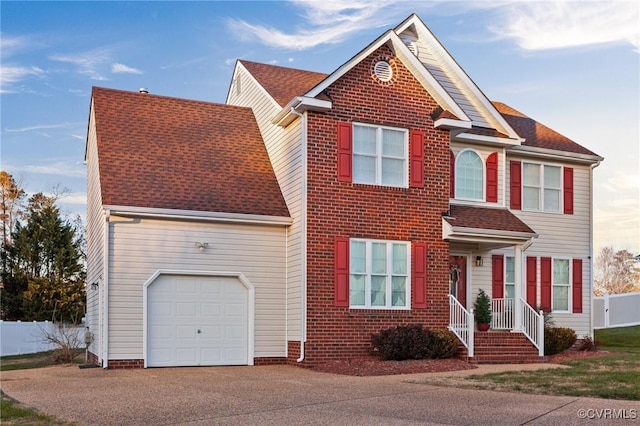 view of front of property featuring a garage