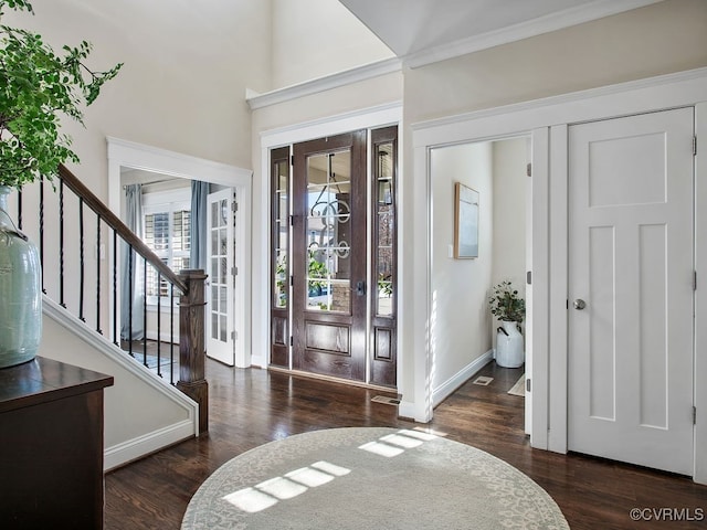 entrance foyer featuring dark hardwood / wood-style floors