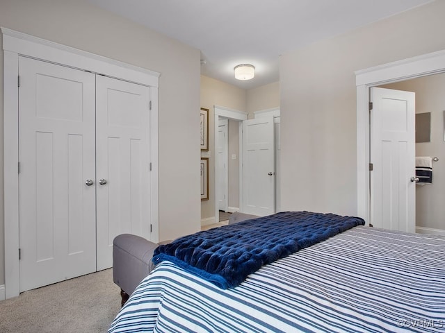 carpeted bedroom with a closet