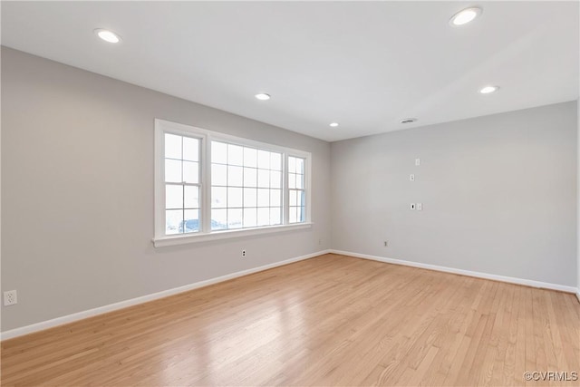 empty room with light wood-type flooring