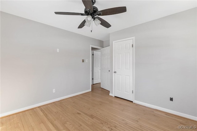 unfurnished bedroom featuring light wood-type flooring and ceiling fan