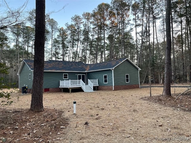 rear view of property with a deck