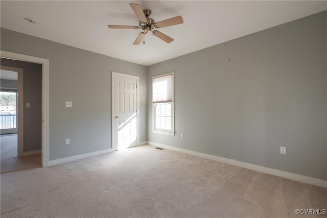 unfurnished bedroom featuring ceiling fan and light colored carpet