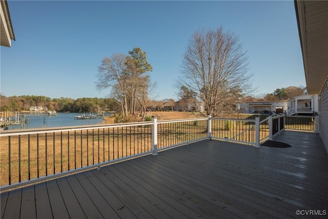 wooden terrace with a water view