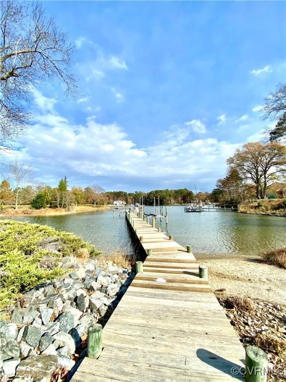 view of dock with a water view