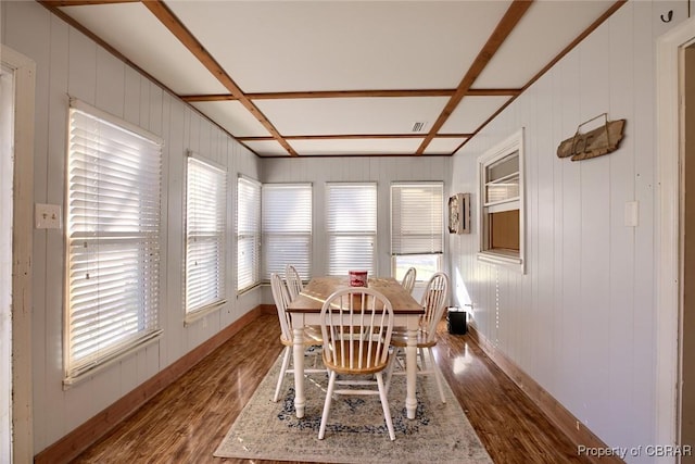 dining space featuring hardwood / wood-style floors