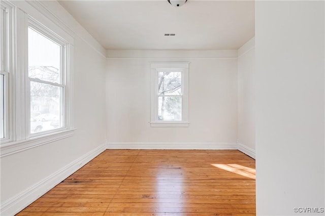 empty room with light wood-type flooring