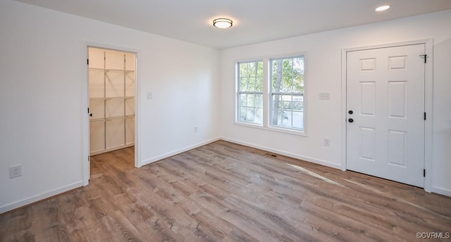 foyer entrance featuring light hardwood / wood-style flooring