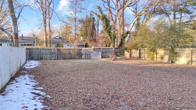 view of yard covered in snow