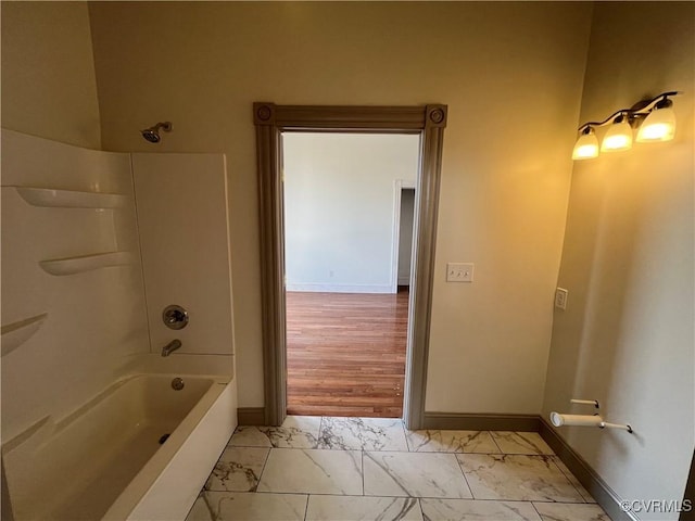 bathroom with shower / bathtub combination