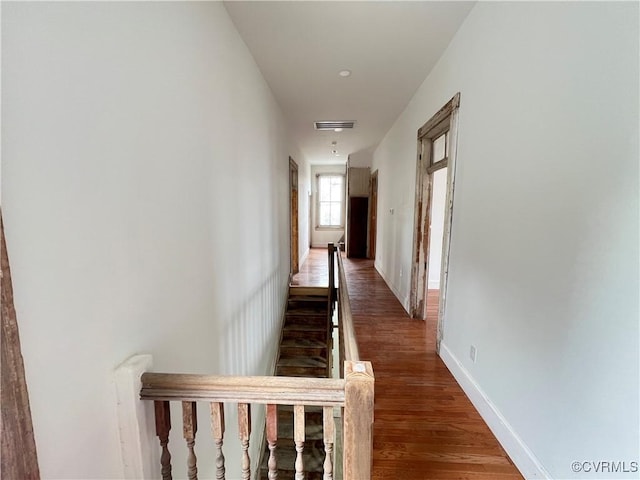 hallway featuring wood-type flooring