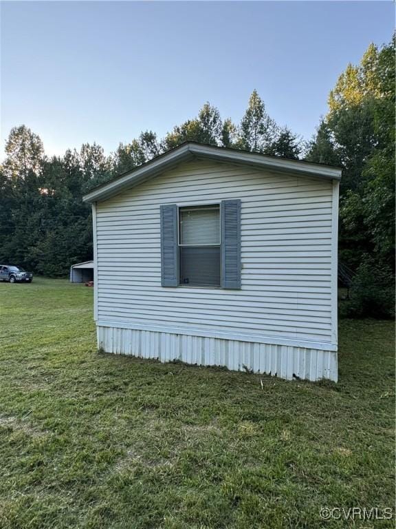 view of property exterior featuring a yard