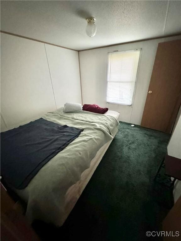 bedroom featuring a textured ceiling