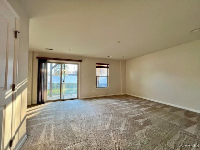 view of carpeted spare room