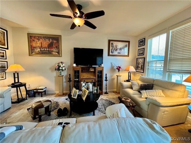 living room with ceiling fan