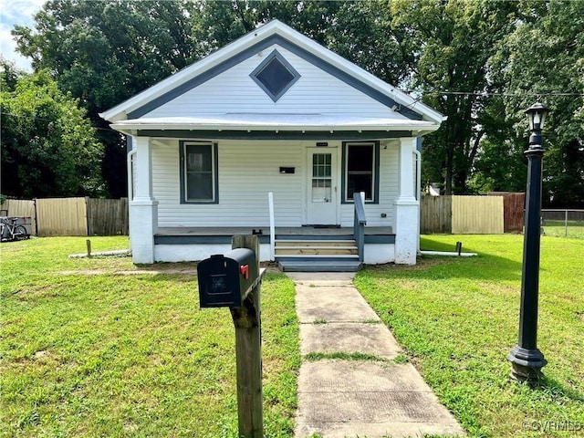 bungalow-style house featuring a front yard and a porch