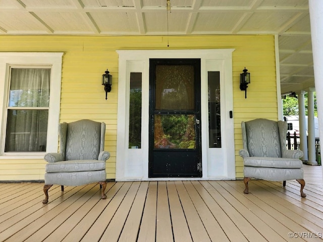 doorway to property featuring a porch