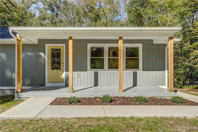 entrance to property with a porch