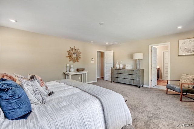 bedroom featuring light carpet