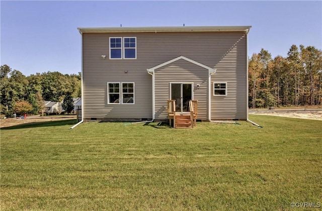 rear view of property featuring a yard