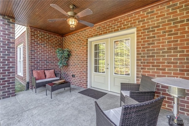 view of patio with ceiling fan and french doors