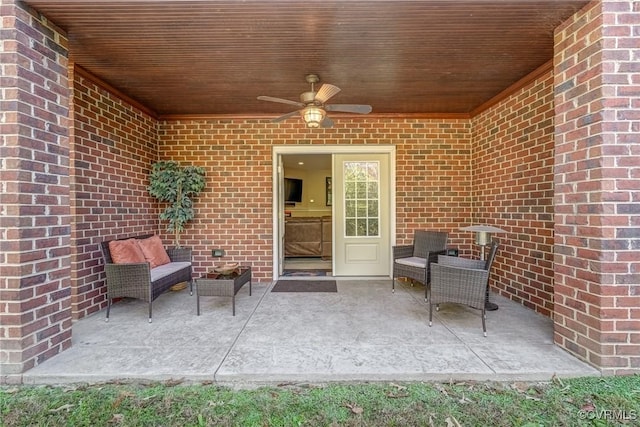 view of patio featuring ceiling fan