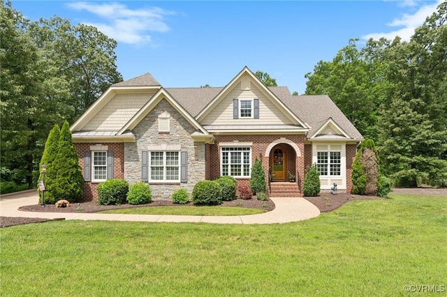 craftsman house with a front lawn