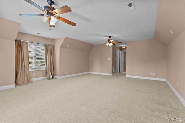 bonus room with light colored carpet, ceiling fan, and lofted ceiling