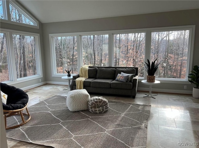 sunroom / solarium with lofted ceiling