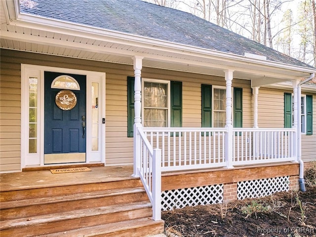 doorway to property with covered porch