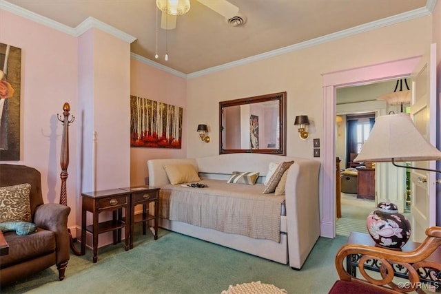 bedroom featuring carpet floors, ceiling fan, and crown molding